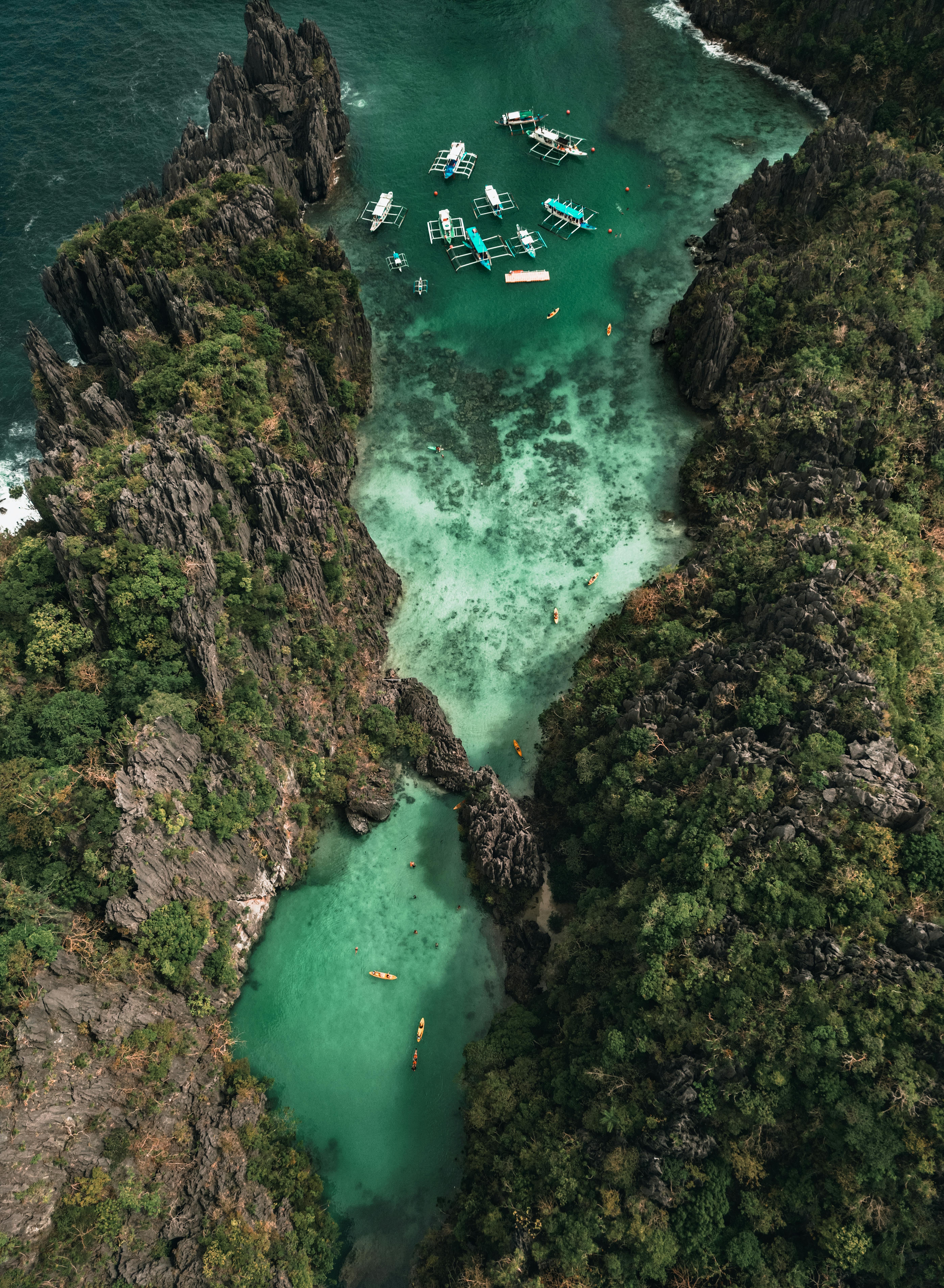 Big Lagoon, El Nido — limestone walls rising from turquoise water at dawn