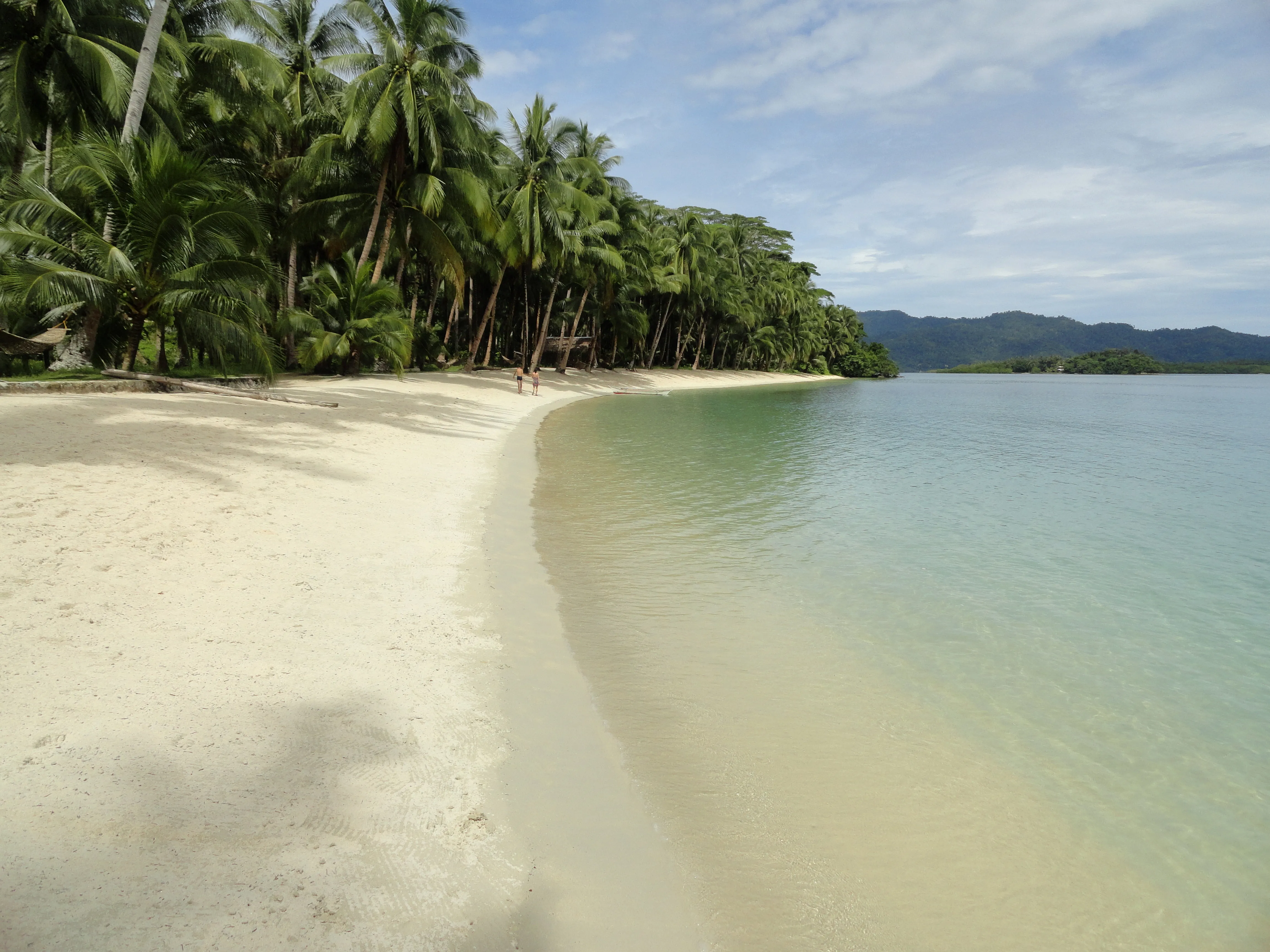 White Beach, Port Barton — calm shallow water and empty sand